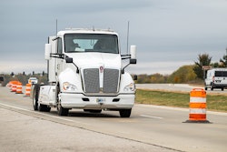 An electric heavy-duty truck provided by Cummins charges as it drives along a test segment on U.S. Highway 52/U.S. Highway 231 in West Lafayette, Indiana.