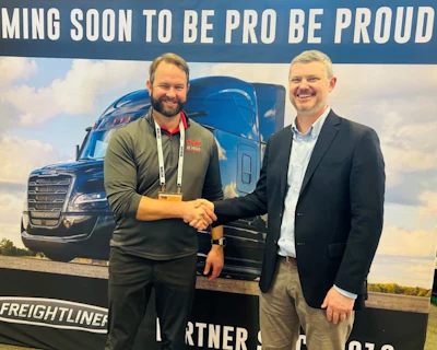 Be Pro Be Proud Executive Director Andrew Parker and Greg Treinen, vice president of on-highway market development at Daimler Truck North America.