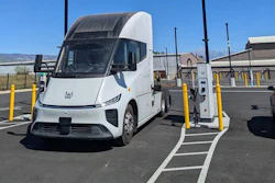 A Windrose truck next to a 1,200 kW Kempower dispenser, capable of providing Megawatt Charging System (MCS) charging at EV Realty's San Bernardino charging hub.