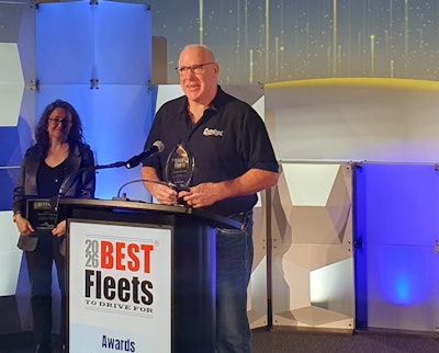 Tony Smith of Crawford Trucking Inc. accepts the 2026 Best Fleets to Drive For Award for the Best Overall Fleet in the small carrier category.