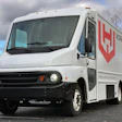 White Workhorse commercial delivery truck with red shield logo and text branding on side panel
