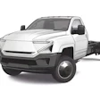 White electric truck chassis with black cab-over design and dual rear wheels on white background