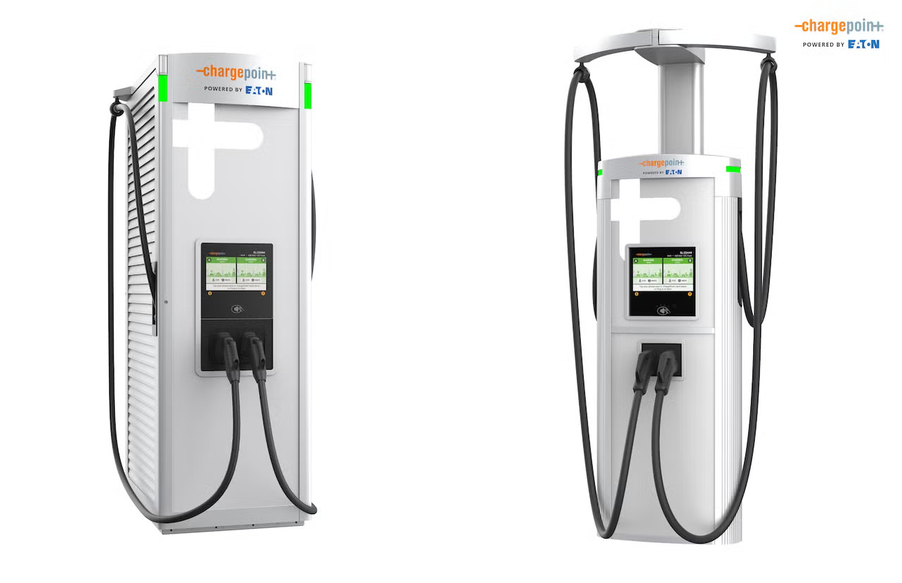 Two ChargePoint Express Solo EV charging stations powered by Eaton, featuring digital display screens and attached charging cables for electric vehicles.