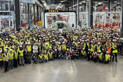 Tesla Semi production line workers pose with the first completed Semi at Gigafactory Nevada.