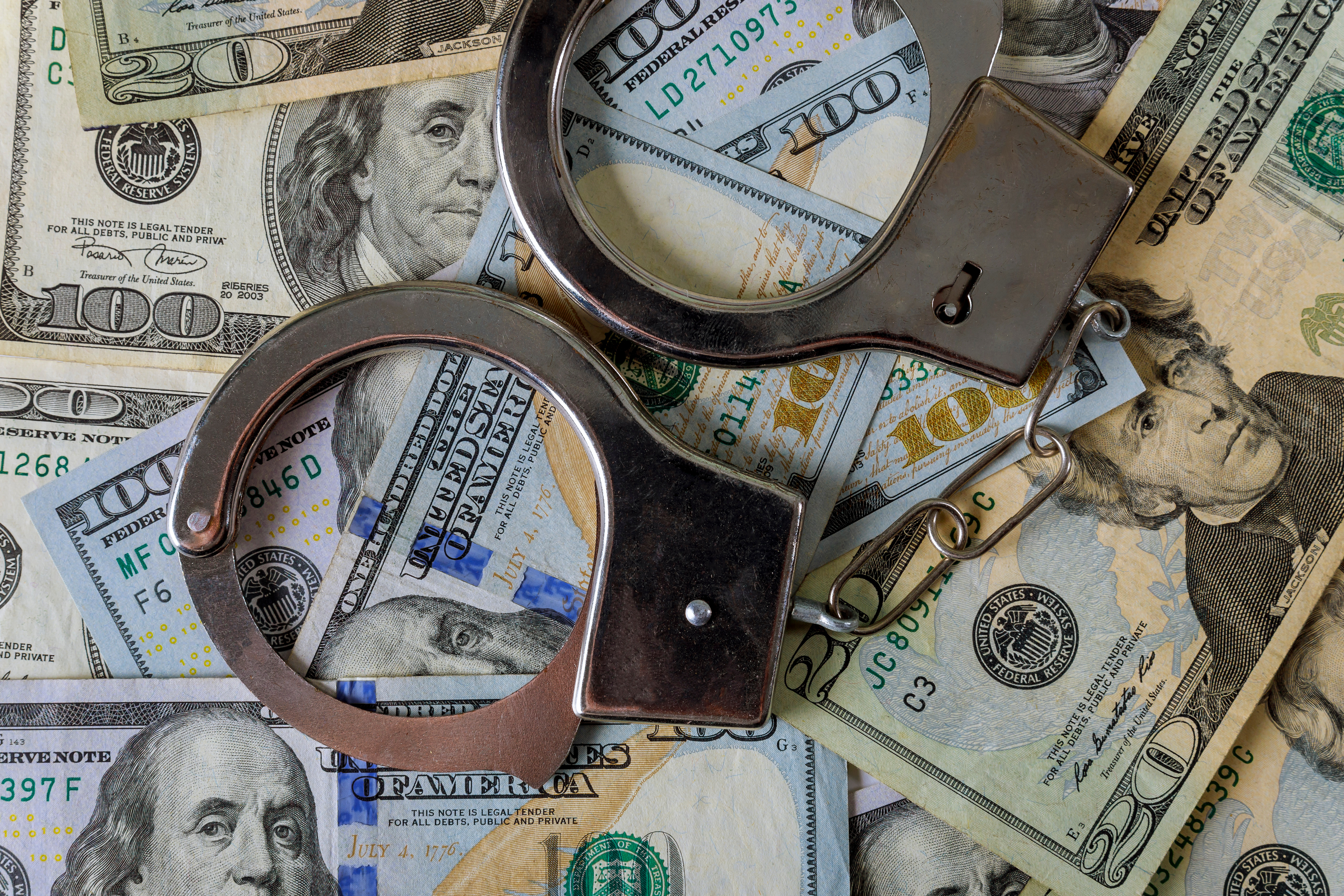 Money Cash Handcuffs Fraud Adobe