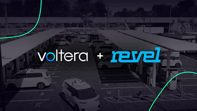 Voltera and Revel announce their partnership, seen against a backdrop of an EV fleet charging hub.