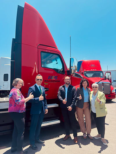 Standing in front of zero-emissions trucks are, from left, Long Beach Harbor Commissioner Sharon L. Weissman, Port of Long Beach CEO Dr. Noel Hacegaba, Bali Express Services Company Director Juan Baez, Mexico’s Los Angeles Consul for Economic Affairs Jacobeth Hernández Mendoza and Harbor Commissioner Bonnie Lowenthal.
