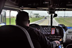 Driver-in-truck-cab-2017-10-03-09-57