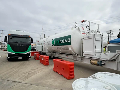 A Nikola Tre fuel cell electric (FCEV) semi-truck acquired by Hyroad Energy parked beside a mobile hydrogen refueling station in Southern California.