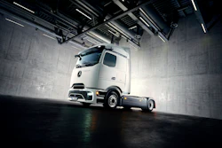 Mercedes-Benz eActros Lowliner showcased in a warehouse.