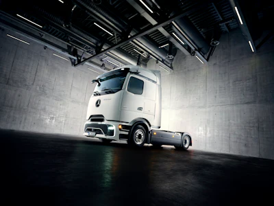 Mercedes-Benz eActros Lowliner showcased in a warehouse.