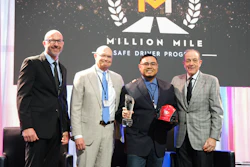 PGT Trucking inducted five new Million Mile Drivers for safe driving in 2025, including Christian Garcia, shown on stage with COO Chad Marsilio, President Gregg Troian and CEO Pat Gallagher.