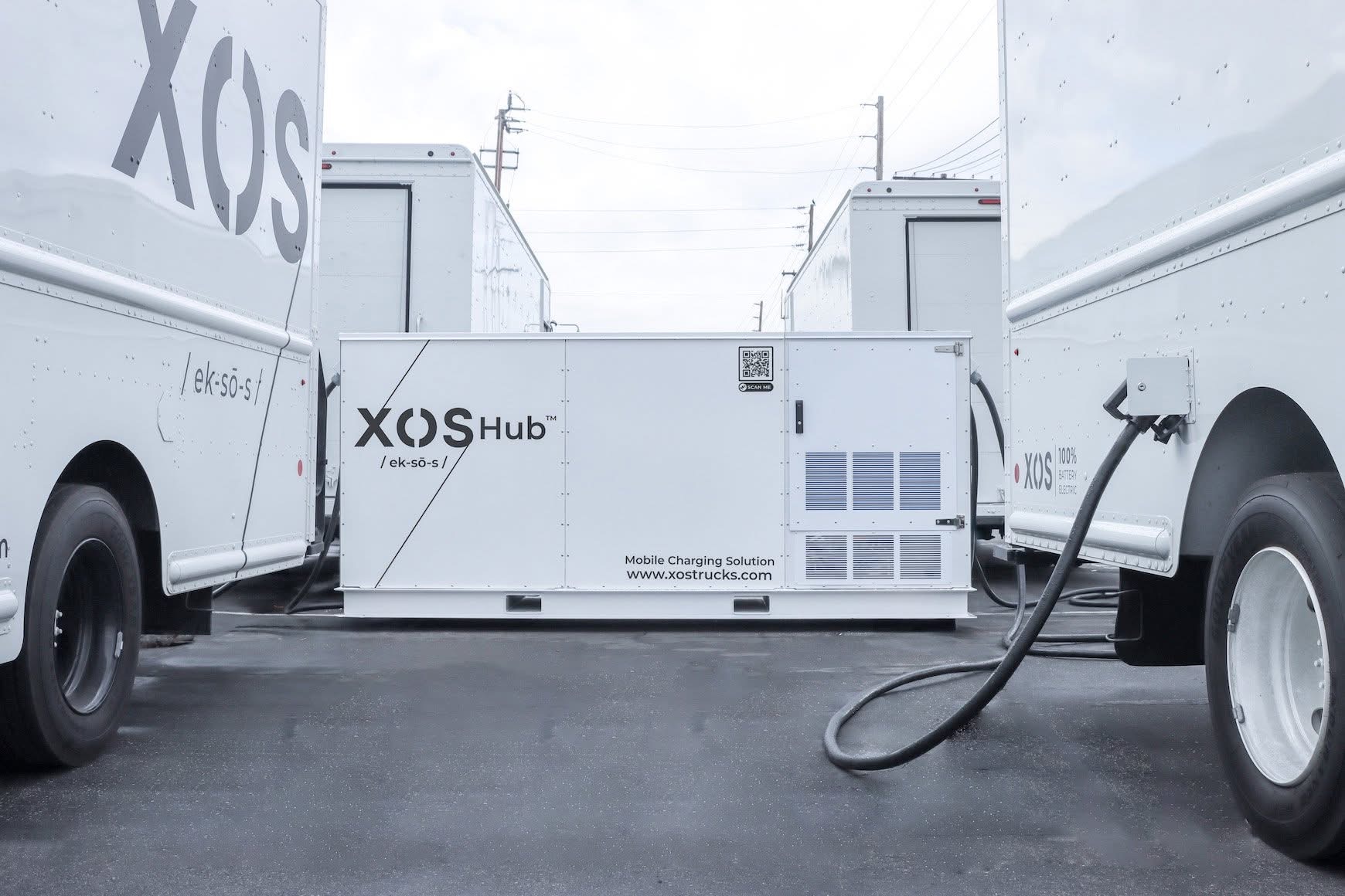The standard Xos Power Hub connected to two battery-electric commercial vehicles.
