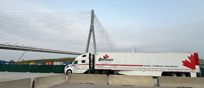 Onfreight Logistics' trucks crossed the new Gordie Howe International Bridge separately from each side when it opened Monday.