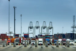 A row of Class 8 drayage semi-trucks at the Port of Los Angeles.
