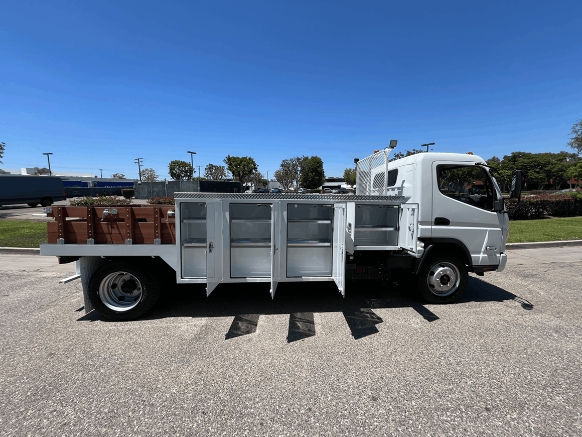 A one-of-a-kind configuration combines lockable storage and a spacious cargo bed in a single zero-emission vehicle. The body supports unique options including cranes, ladder racks, generators, lift gates, and work lighting for a wide range of vocational applications.