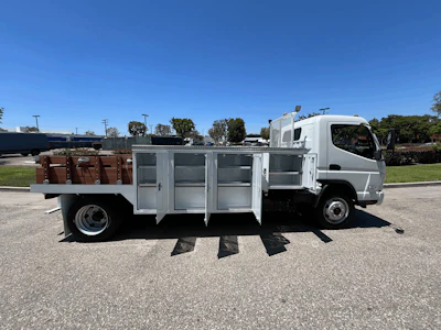 A one-of-a-kind configuration combines lockable storage and a spacious cargo bed in a single zero-emission vehicle. The body supports unique options including cranes, ladder racks, generators, lift gates, and work lighting for a wide range of vocational applications.