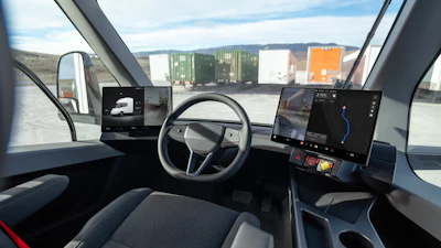 The Tesla Semi's center-seat driving position features dual digital displays.