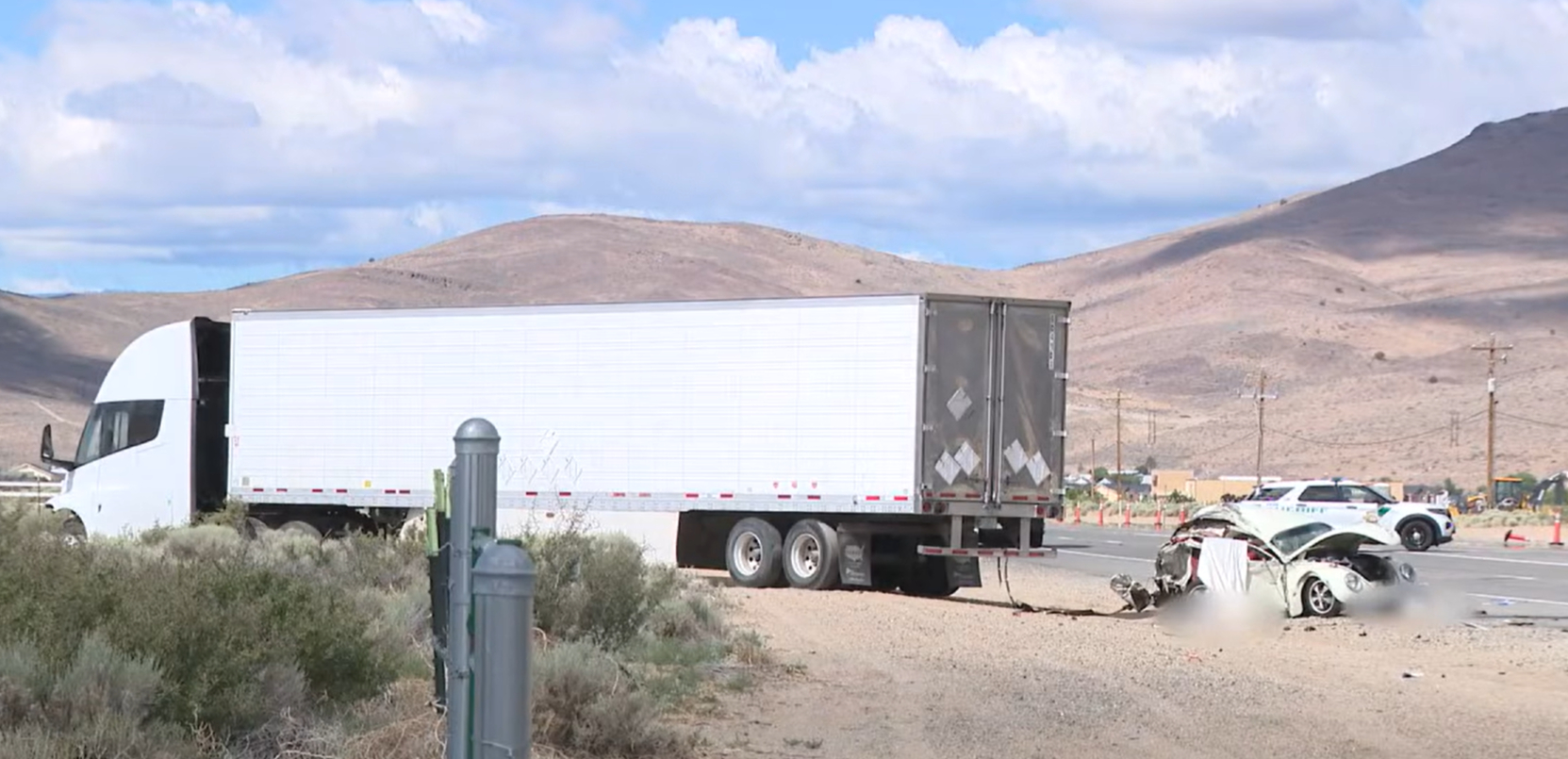 The aftermath of a fatal collision involving a Tesla Semi and a Volkswagen Beetle in Dayton, Nevada.