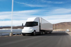 A rendering of the Tesla Semi hauling a trailer along a highway.