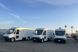 Three battery-electric Workhorse W56 step vans in a parking lot.