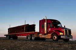 This Kenworth in Otto Transfer's fleet, hauling poles in its specialized operation, is no longer part of the all-Daimler power collection today. but certianly captures the company bread and butter over-the-road.