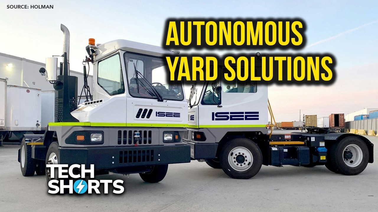Autonomous ISEE yard truck with autonomous solutions branding in industrial yard setting