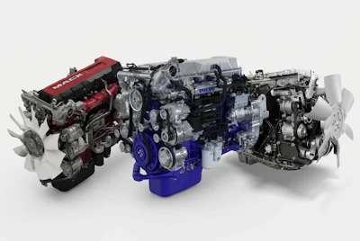 Collection of Volvo diesel and gasoline engines displayed in various configurations with red, blue, and silver finishes